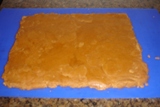 Match a template cutout to the rolled dough